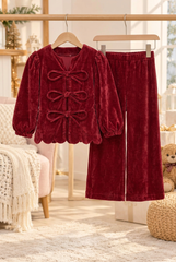 3D hanging velvet outfit on separate wooden hangers with a shared wooden rod